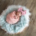 Newborn Yamihle cute in a pink bow