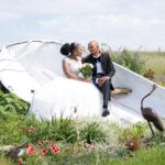 Sowing seeds of love on a countryside wedding farm